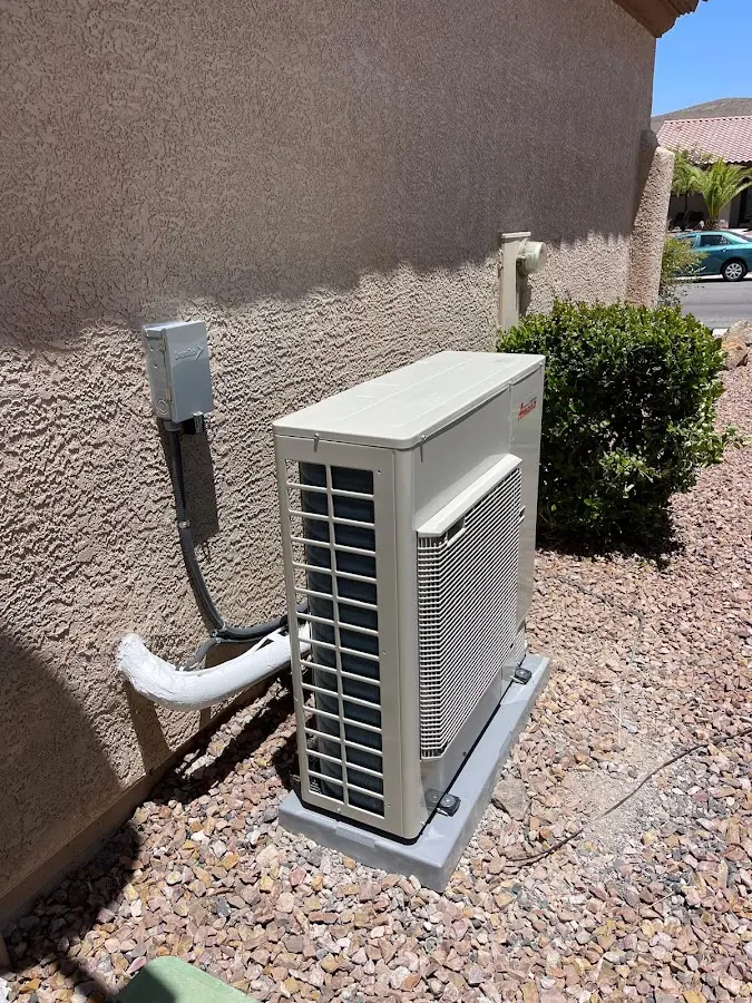 Residential air conditioning condenser unit in Davison